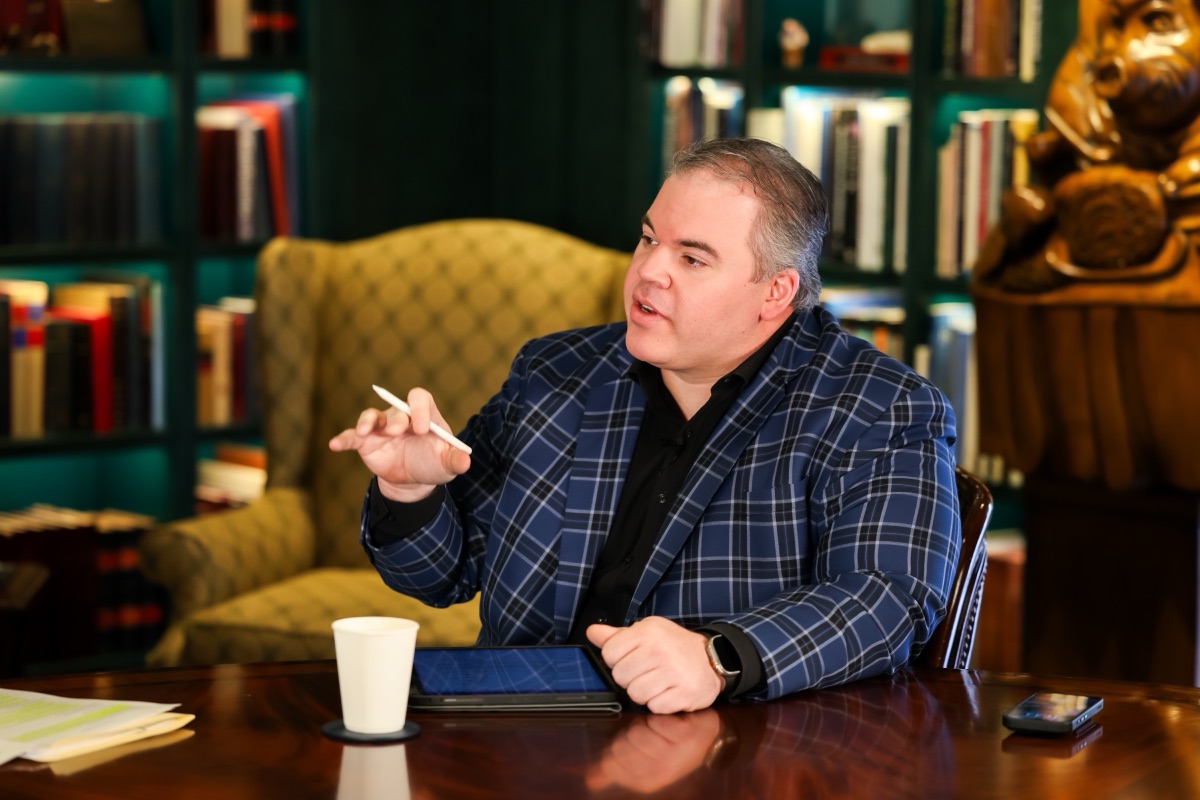 Ryan Harper, co-host of The Deal Table and founder of Harper Belmont Media